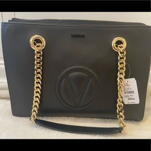 Valentino handbag, black with gold hardware.
